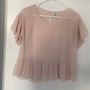 Never worn short sleeve top, slightly sheer